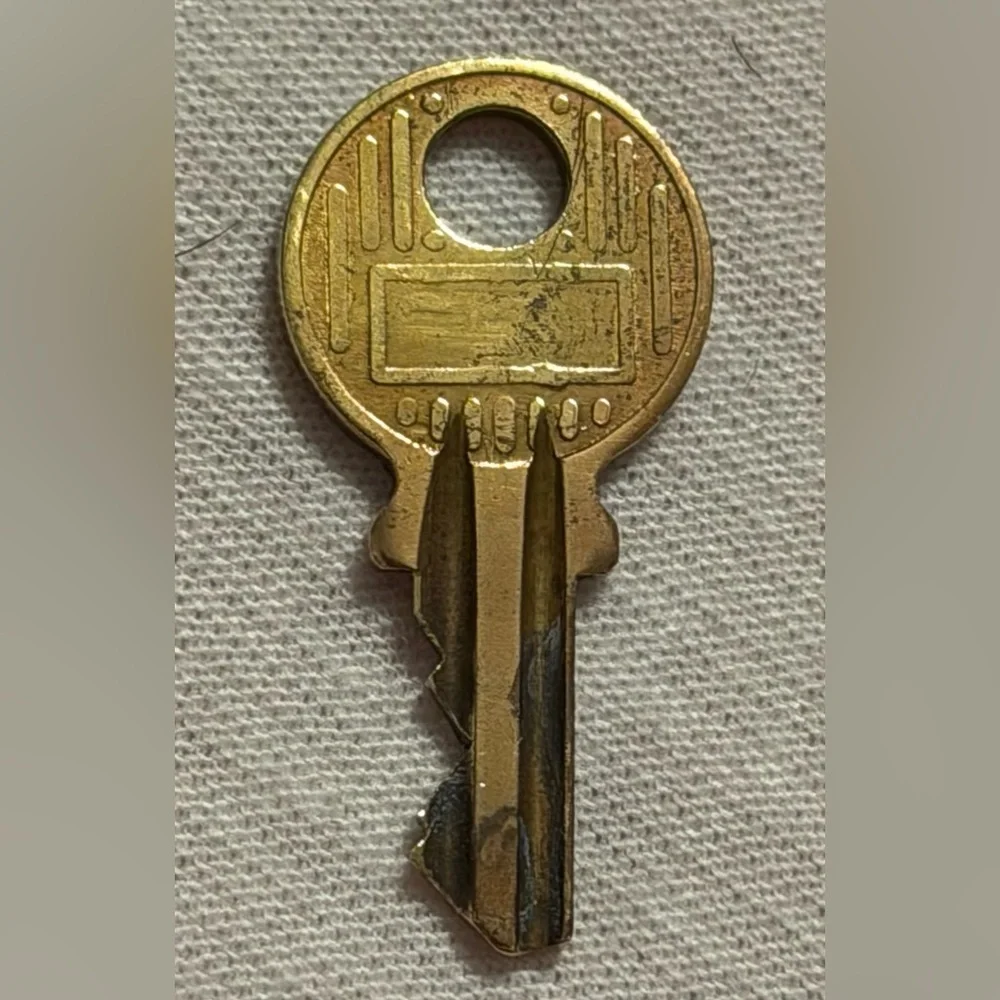 Louis Vuitton Gold Padlock with Key